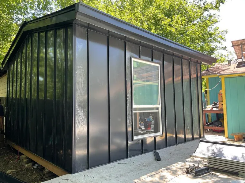 Black standing seam metal wall panels for Roof Inspection in Old Town